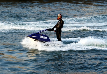 This photo of a jet skier on a Yamaha (OK ... a free ad!) jet ski was taken by Remi Jouan and is used courtesy of the GNU Free Documentation 1.2 License. (http://commons.wikimedia.org/wiki/File:Capebreton_jet_ski.jpg)